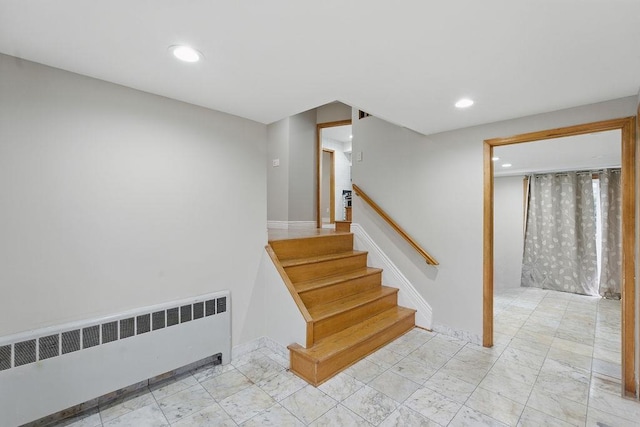 73 Fox Pl, Hicksville, NY 11801 - staircase featuring radiator, recessed lighting, and baseboards