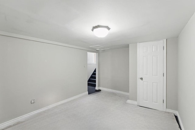 73 Fox Pl, Hicksville, NY 11801 - basement with stairway, baseboards, and light carpet