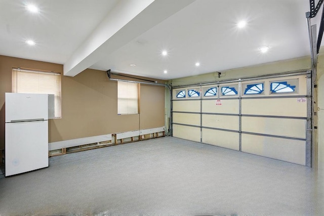 73 Fox Pl, Hicksville, NY 11801 - garage featuring freestanding refrigerator and recessed lighting