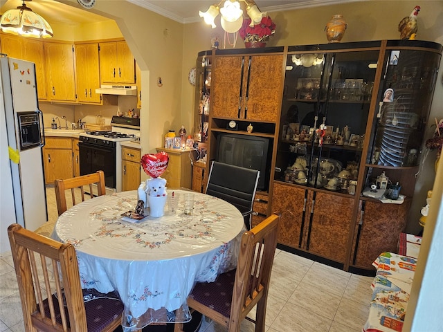 199-06 24th Rd, Whitestone, NY 11357 - dining space with ornamental molding, light tile patterned floors, and arched walkways
