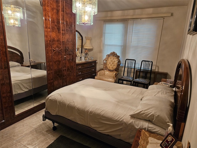 199-06 24th Rd, Whitestone, NY 11357 - bedroom featuring a chandelier and tile patterned flooring