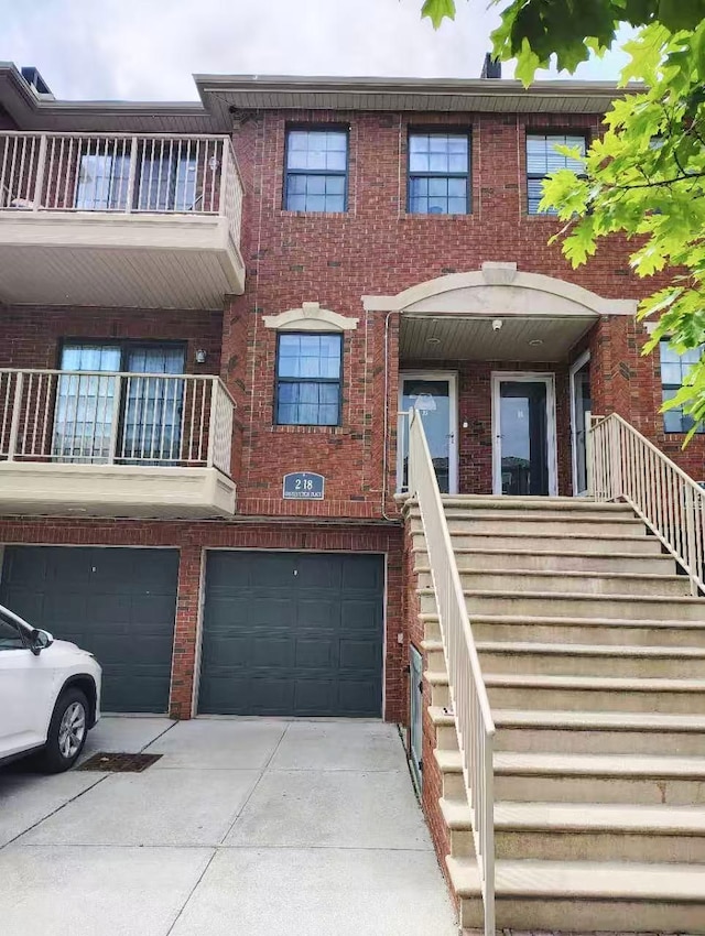 2-18A Constitution Pl Unit 173, College Point, NY 11356 - townhome / multi-family property featuring stairway and brick siding