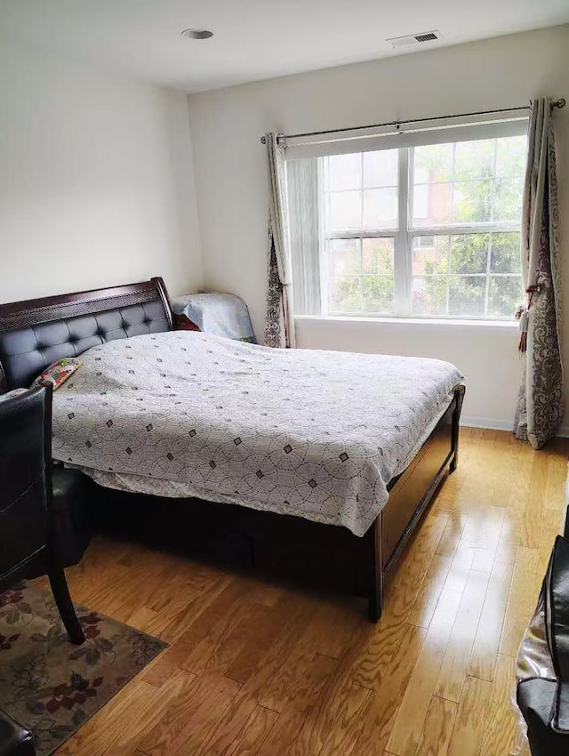 2-18A Constitution Pl Unit 173, College Point, NY 11356 - bedroom with light wood-type flooring and baseboards