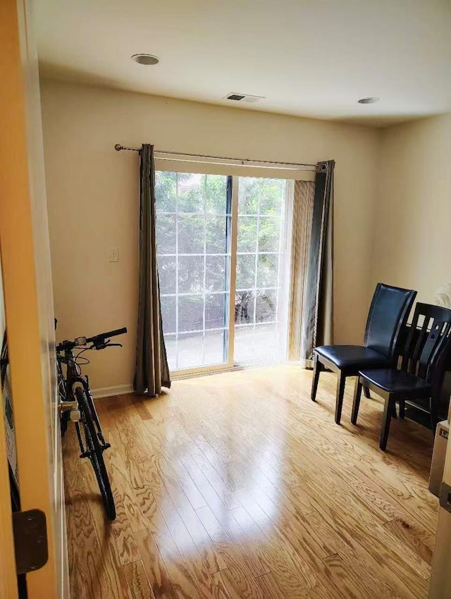 2-18A Constitution Pl Unit 173, College Point, NY 11356 - living area with wood finished floors and baseboards