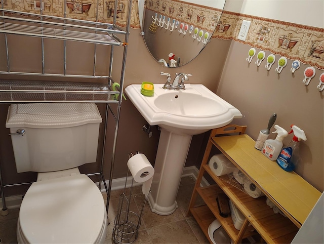 2-18A Constitution Pl Unit 173, College Point, NY 11356 - half bath featuring toilet, tile patterned floors, and a sink