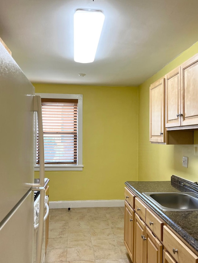 604 Tompkins Ave Unit B-2, Mamaroneck, NY 10543 - kitchen featuring freestanding refrigerator and dark countertops