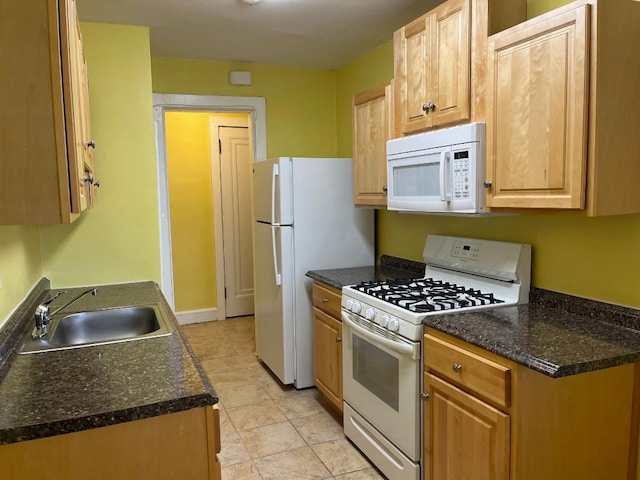 604 Tompkins Ave Unit B-2, Mamaroneck, NY 10543 - kitchen with white appliances and dark countertops