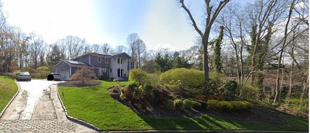26 Stepping Stone Cres, Dix Hills, NY 11746 - view of front of home featuring driveway, a front lawn, and a garage