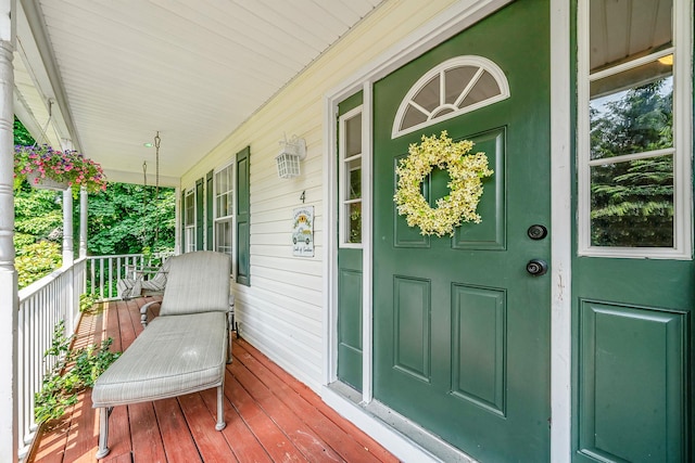 4 Ariel Ct, Rocky Point, NY 11778 - entrance to property with a porch