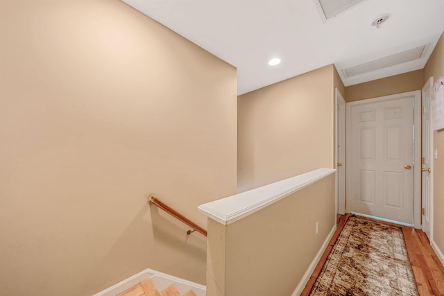 4 Ariel Ct, Rocky Point, NY 11778 - hall with an upstairs landing, light wood-type flooring, attic access, and recessed lighting