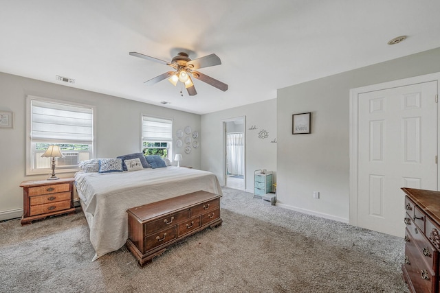 4 Ariel Ct, Rocky Point, NY 11778 - carpeted bedroom with baseboards and ceiling fan