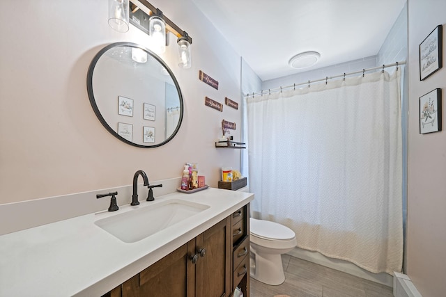 4 Ariel Ct, Rocky Point, NY 11778 - full bathroom featuring vanity, wood finished floors, and shower / bath combination with curtain