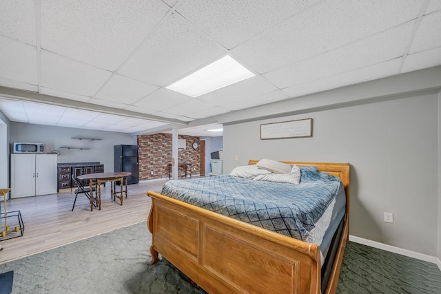 4 Ariel Ct, Rocky Point, NY 11778 - bedroom featuring a paneled ceiling, carpet, and wood finished floors
