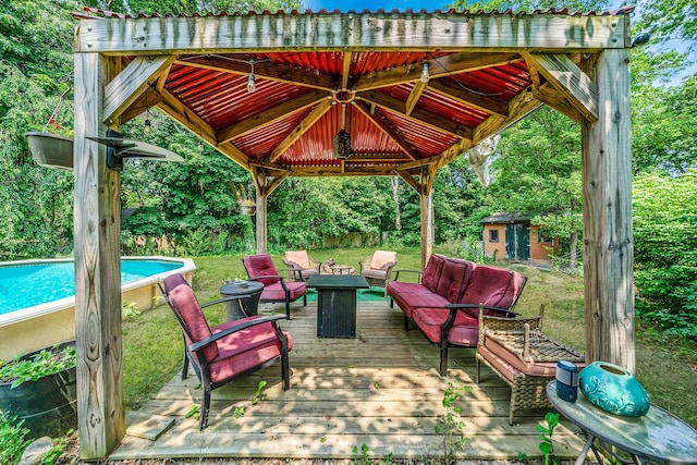 4 Ariel Ct, Rocky Point, NY 11778 - view of patio featuring a wooden deck, an outdoor living space, an outdoor pool, a gazebo, and an outdoor structure