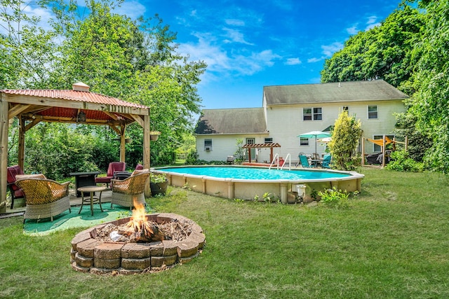4 Ariel Ct, Rocky Point, NY 11778 - swimming pool with a fire pit, a gazebo, a lawn, and a patio