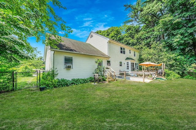 4 Ariel Ct, Rocky Point, NY 11778 - rear view of house with a gate and cooling unit