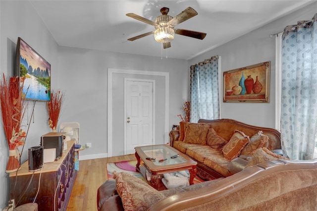 31 Tapscott St, Brooklyn, NY 11212 - living room featuring light wood-style flooring and a ceiling fan