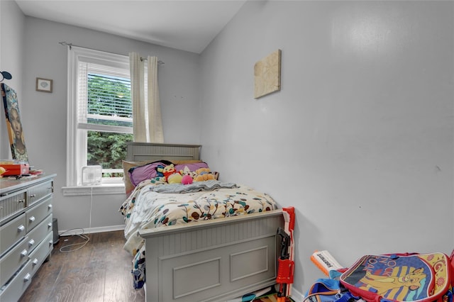 31 Tapscott St, Brooklyn, NY 11212 - bedroom featuring dark wood-style floors and baseboards