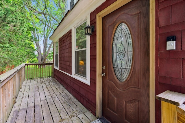 80 Diana Dr, Mastic Beach, NY 11951 - view of exterior entry with a deck