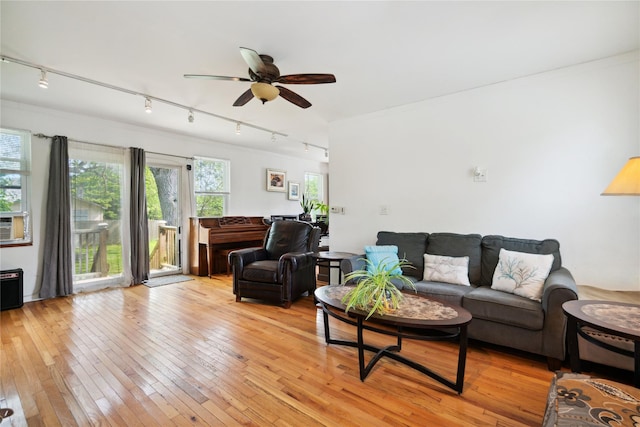 80 Diana Dr, Mastic Beach, NY 11951 - living room featuring rail lighting, a ceiling fan, and light wood finished floors