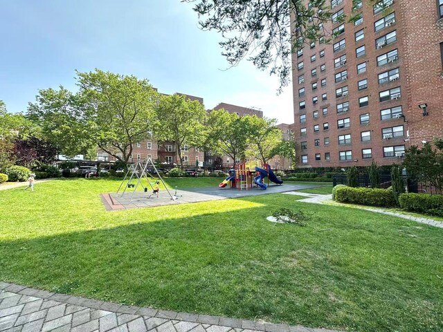 99-60 63rd Rd Unit 5W, Rego Park, NY 11374 - surrounding community featuring a yard