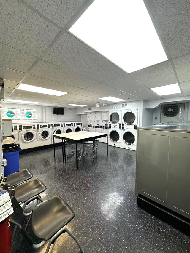 99-60 63rd Rd Unit 5W, Rego Park, NY 11374 - community laundry featuring stacked washing machine and dryer and washer and dryer