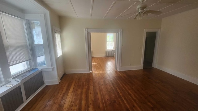 109 Garden St, Poughkeepsie, NY 12601 - spare room featuring radiator, hardwood / wood-style flooring, ceiling fan, and baseboards