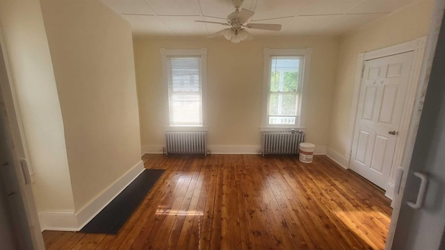 109 Garden St, Poughkeepsie, NY 12601 - spare room with radiator, baseboards, ceiling fan, and hardwood / wood-style floors