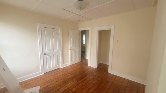 109 Garden St, Poughkeepsie, NY 12601 - unfurnished bedroom with hardwood / wood-style flooring and baseboards