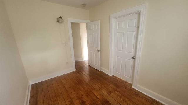 109 Garden St, Poughkeepsie, NY 12601 - spare room with dark wood-style floors and baseboards