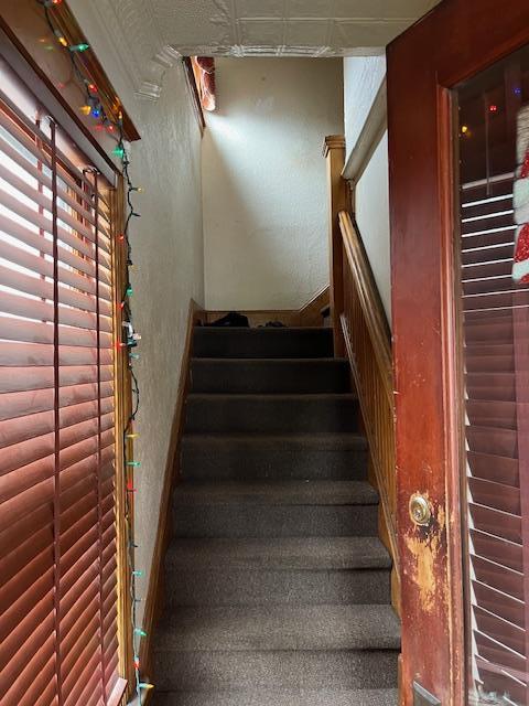 39 Harrison St, Middletown, NY 10940 - staircase with a textured wall