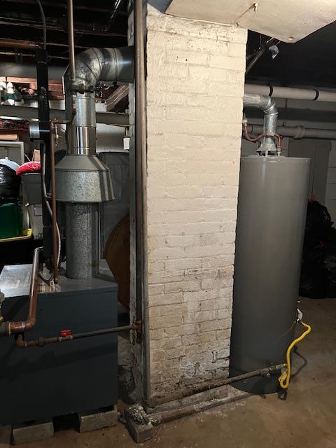 39 Harrison St, Middletown, NY 10940 - utility room featuring water heater