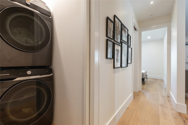 290 Mountain Rd, Pleasantville, NY 10570 - washroom with stacked washer / drying machine, light wood finished floors, and recessed lighting