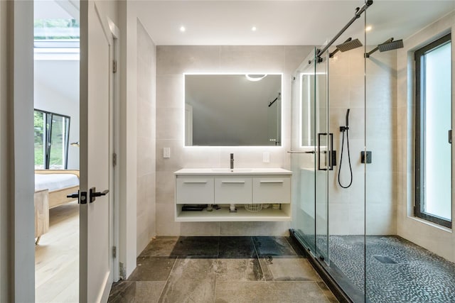 290 Mountain Rd, Pleasantville, NY 10570 - bathroom featuring connected bathroom, healthy amount of natural light, a shower stall, vanity, and recessed lighting