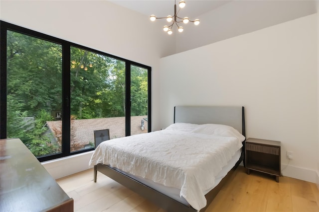 290 Mountain Rd, Pleasantville, NY 10570 - bedroom featuring a chandelier and light wood finished floors