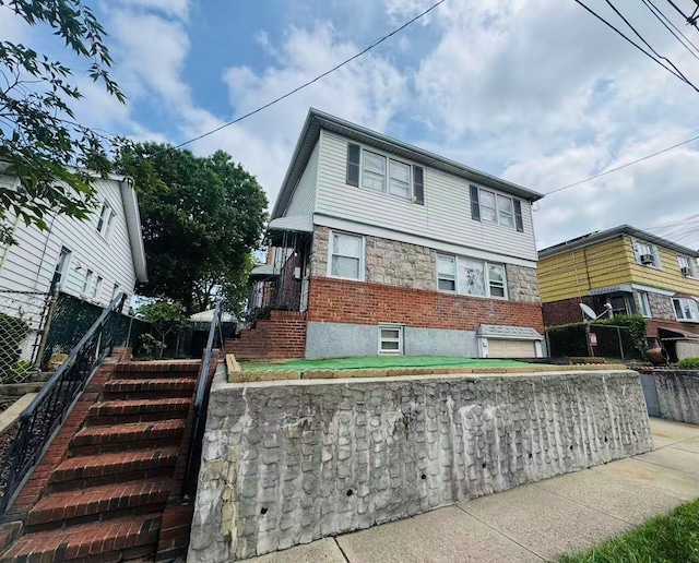 136-23 61st Rd, Flushing, NY 11367 - view of front facade featuring brick siding