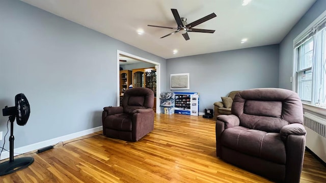 136-23 61st Rd, Flushing, NY 11367 - living area with ceiling fan, light wood-style flooring, baseboards, radiator, and recessed lighting