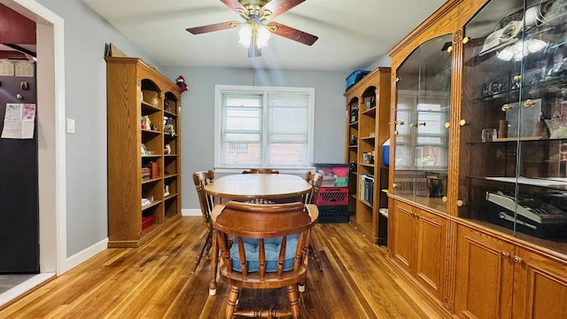 136-23 61st Rd, Flushing, NY 11367 - office with a ceiling fan, wood finished floors, and baseboards