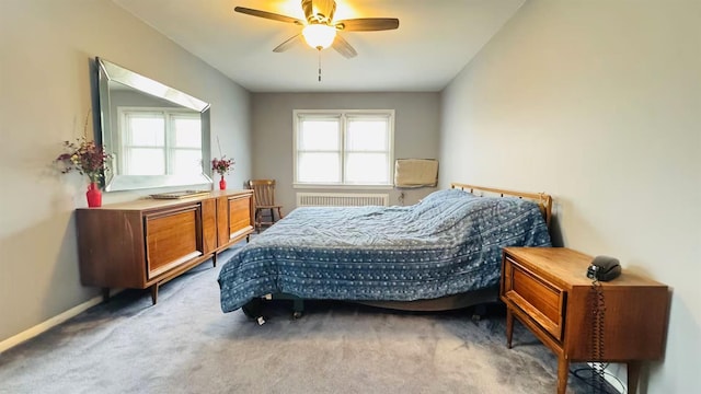 136-23 61st Rd, Flushing, NY 11367 - bedroom with radiator heating unit, carpet, baseboards, and ceiling fan