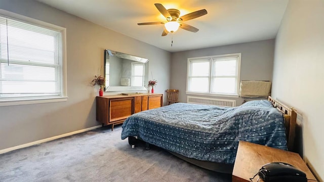 136-23 61st Rd, Flushing, NY 11367 - bedroom featuring radiator heating unit, carpet floors, baseboards, and ceiling fan