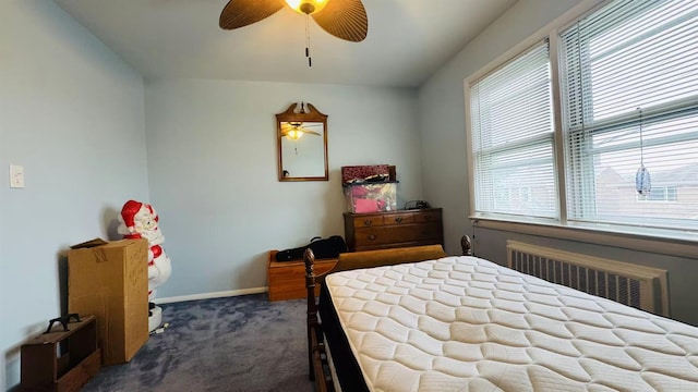 136-23 61st Rd, Flushing, NY 11367 - bedroom featuring radiator, dark colored carpet, baseboards, and ceiling fan