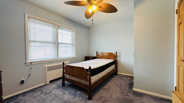 136-23 61st Rd, Flushing, NY 11367 - carpeted bedroom featuring radiator heating unit, baseboards, and ceiling fan