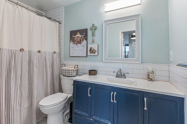 9-05 166th St Unit 4A, Beechhurst, NY 11357 - bathroom with tile walls, vanity, toilet, wainscoting, and curtained shower