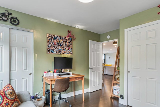 9-05 166th St Unit 4A, Beechhurst, NY 11357 - home office with dark wood-type flooring and baseboards