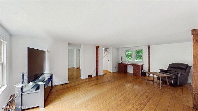 1002 Kitchawan Rd, Ossining, NY 10562 - living area featuring light wood-type flooring and stairway