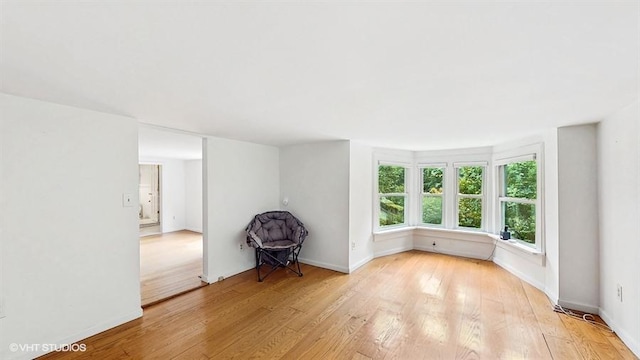 1002 Kitchawan Rd, Ossining, NY 10562 - unfurnished room featuring light wood-type flooring and baseboards
