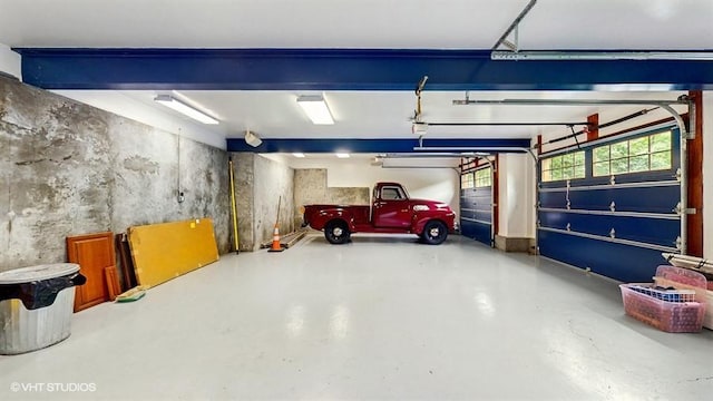 1002 Kitchawan Rd, Ossining, NY 10562 - garage featuring a garage door opener