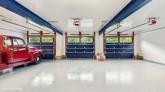1002 Kitchawan Rd, Ossining, NY 10562 - garage featuring a garage door opener