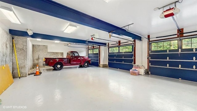 1002 Kitchawan Rd, Ossining, NY 10562 - garage featuring a garage door opener