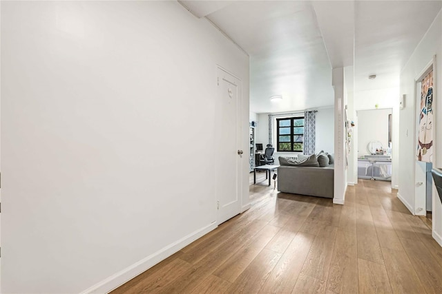 26-20 141st St Unit 4A, Flushing, NY 11354 - hallway with wood-type flooring and baseboards